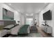 Staged main bedroom with bay views, contemporary furniture, and modern art at 2910 W Barcelona St # Ph-2303, Tampa, FL 33629