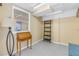 Bonus room with a bright window and ladder shelf provides flexible space for your needs at 340 Pinellas Bayway S # 306, Tierra Verde, FL 33715