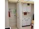 Pantry featuring adjustable shelving and adjacent countertop space with storage cabinets at 4920 Locust Ne St # 203, St Petersburg, FL 33703