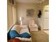 Relaxing sitting area with comfortable seating and view of the complex grounds at 4920 Locust Ne St # 203, St Petersburg, FL 33703