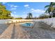 Community pool area features plenty of lounge chairs and privacy fence at 6320 Grand Bahama Cir # 6320, Tampa, FL 33615