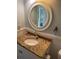 Bathroom featuring granite countertops, classic fixtures, and ample natural light, a serene and functional space at 103 Old Mill Pond Rd, Palm Harbor, FL 34683