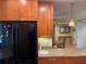 Kitchen featuring wood cabinets, granite countertops, and modern stainless steel appliances at 103 Old Mill Pond Rd, Palm Harbor, FL 34683