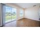Inviting living space features sliding glass doors leading to the outdoors at 1348 Impatiens Ct, Trinity, FL 34655