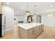 Kitchen island with stone countertop and stainless steel appliances at 3640 15Th N St, St Petersburg, FL 33704