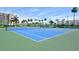 Outdoor community tennis courts ready for match play at 7600 Sun Island S Dr # 804, South Pasadena, FL 33707