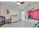 room with large mirror, white dresser, and neutral carpet at 1753 Lucas Dr, Clearwater, FL 33759