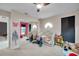 room with large mirror, plush carpet, and decorative lighting at 1753 Lucas Dr, Clearwater, FL 33759