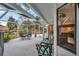 Screened-in patio with outdoor seating, providing a relaxing space next to the yard at 1753 Lucas Dr, Clearwater, FL 33759