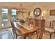 Formal dining room featuring elegant furnishings, a chandelier, and access to the outdoor space at 3222 W Empedrado St, Tampa, FL 33629