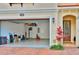 Neat garage with ample storage space and an epoxy-coated floor, conveniently attached to the home's entrance at 3222 W Empedrado St, Tampa, FL 33629