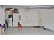 Spacious garage with ample storage shelving and a clean, epoxy-coated floor at 3222 W Empedrado St, Tampa, FL 33629