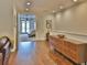 Hallway with hardwood flooring featuring the entryway to the main bedroom at 3222 W Empedrado St, Tampa, FL 33629