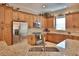 Well-equipped kitchen featuring stainless steel appliances, granite countertops, and ample cabinetry at 3222 W Empedrado St, Tampa, FL 33629