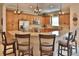 Well-equipped kitchen with stainless steel appliances, a breakfast bar, and plenty of cabinet space at 3222 W Empedrado St, Tampa, FL 33629
