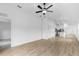 Spacious living room boasts wood floors and recessed lighting at 3418 Eagle Pass St, North Port, FL 34286
