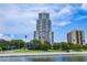 Stunning high-rise condo building with beautiful balconies and waterfront views, surrounded by lush landscaping at 3507 Bayshore Blvd # 102, Tampa, FL 33629