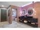 Luxurious bathroom features marble countertop sinks, stylish lighting, and modern fixtures at 5809 Cruiser Way, Tampa, FL 33615