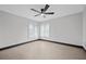 Bright bedroom featuring neutral walls and modern fixtures, creating a serene and inviting living space at 5809 Cruiser Way, Tampa, FL 33615