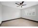 Bright bedroom featuring neutral walls and modern fixtures, creating a serene and inviting living space at 5809 Cruiser Way, Tampa, FL 33615
