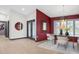 Dining area with a modern chandelier, elegant decor and natural light at 5809 Cruiser Way, Tampa, FL 33615