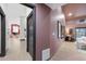 Inviting hallway showcases high ceilings and neutral tones leading to a bright living area at 5809 Cruiser Way, Tampa, FL 33615