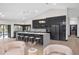 Modern kitchen with a large island, pendant lighting, and stainless steel appliances at 5809 Cruiser Way, Tampa, FL 33615