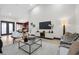 Open-concept living room with hardwood floors and neutral decor at 5809 Cruiser Way, Tampa, FL 33615