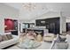 Bright living room showcases modern décor, high ceilings, and seamless transition to the kitchen at 5809 Cruiser Way, Tampa, FL 33615