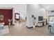 Open-concept living area with neutral tones and hardwood floors at 5809 Cruiser Way, Tampa, FL 33615