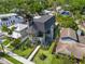 An aerial view of the luxurious house with stone accents and lush landscaping at 807 W Park Ave, Tampa, FL 33602