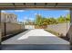 View from garage to a long and newly paved driveway leading to the street at 807 W Park Ave, Tampa, FL 33602