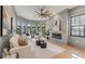 This living room features hardwood floors, a modern fireplace, and an abundance of natural light at 807 W Park Ave, Tampa, FL 33602