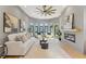 This living room features large windows, a modern fireplace, and neutral-toned furniture at 807 W Park Ave, Tampa, FL 33602