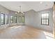 Spacious living room with hardwood floors and ample natural light at 807 W Park Ave, Tampa, FL 33602