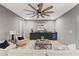 Inviting living room featuring a wet bar with mini fridge, comfortable seating, and stylish decor accents at 807 W Park Ave, Tampa, FL 33602
