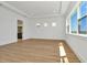 Light filled bedroom with tray ceiling, recessed lights and three windows at 8347 Golden Beach Ct, Parrish, FL 34219