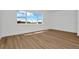 Empty bedroom with a window providing natural light and an outdoor view at 8347 Golden Beach Ct, Parrish, FL 34219