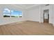 Empty bedroom with window providing natural light with a picturesque view at 8347 Golden Beach Ct, Parrish, FL 34219