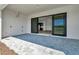 Covered patio with brick flooring, and a view of the home's interior at 8347 Golden Beach Ct, Parrish, FL 34219