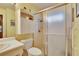 Bright bathroom featuring a glass-enclosed shower and vanity at 13108 Dobree Pl, Riverview, FL 33579