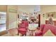 Inviting living room featuring vaulted ceilings, archways, and a cozy fireplace at 13108 Dobree Pl, Riverview, FL 33579