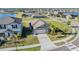 Overhead shot of a home featuring landscaped yard and community lake access at 9805 Lemon Drop Loop, Sun City Center, FL 33573