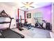 Exercise room features modern equipment and natural light at 9805 Lemon Drop Loop, Sun City Center, FL 33573