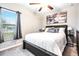 Bedroom with ceiling fan, modern decor and lots of light at 9805 Lemon Drop Loop, Sun City Center, FL 33573