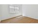 Bright room with wood floors and a view from the window at 12660 Glenn Creek Dr, Riverview, FL 33569