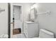 Bathroom features white vanity and fixtures and tiled floor at 5101 Oakhaven Ln, Temple Terrace, FL 33617