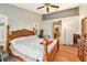 Spacious main bedroom featuring laminate floors, large windows, and ample closet space at 6009 County Line Rd, Spring Hill, FL 34606