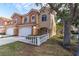 Charming two-story townhouse with a well-maintained lawn and attached garage in a gated community with mature trees at 6224 Vista Verde W Dr, St Petersburg, FL 33707