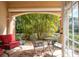 Outdoor patio offering a relaxing seating area surrounded by lush greenery at 6224 Vista Verde W Dr, St Petersburg, FL 33707